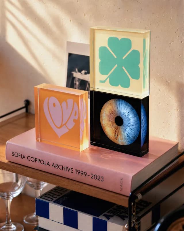 Iris acrylic blocks displayed on a shelf